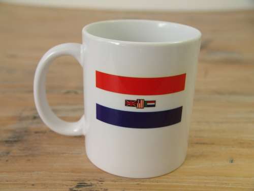 Old South African flag on a coffee mug