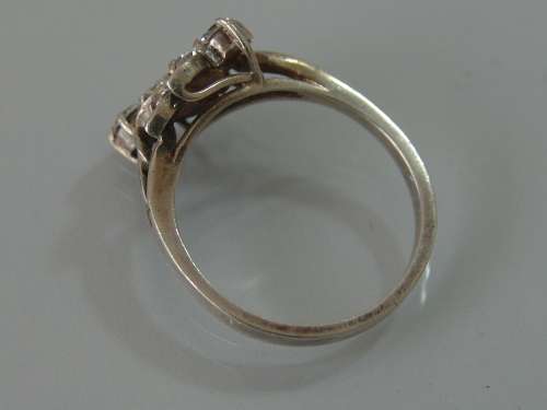 Vintage silver ring set with diamantes in a flower pattern