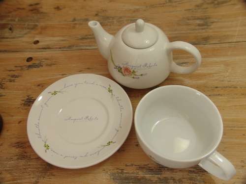 Stackable porcelain Teapot, Cup and Saucer from the Margaret Roberts collection