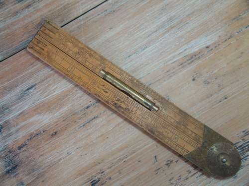 3ft Wood and brass foldable rule, with build in brass level