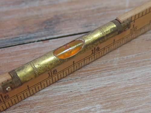 3ft Wood and brass foldable rule, with build in brass level