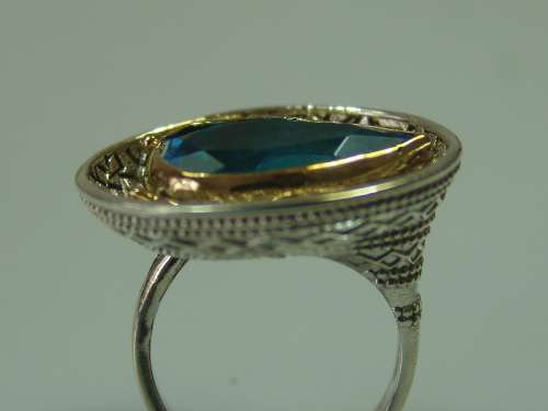 Chunky and heavy silver and Gilded Ring set with blue stone, 10.1grams