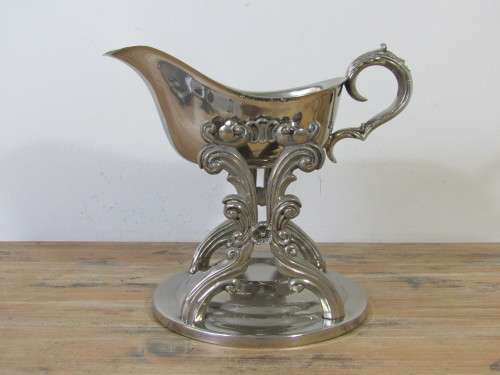 Silver plated Victorian tilting gravy boat with warming stand