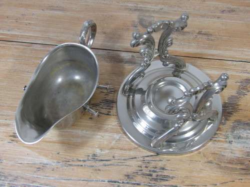 Silver plated Victorian tilting gravy boat with warming stand