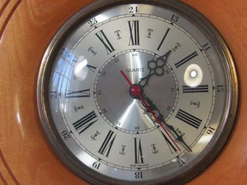 Set of two yellowwood West Germany made Clock and Barometer, 35cm diameter