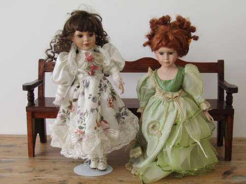 2 x Vintage porcelain Dolls with wooden Bench, 40cm dolls and 54cm bench.