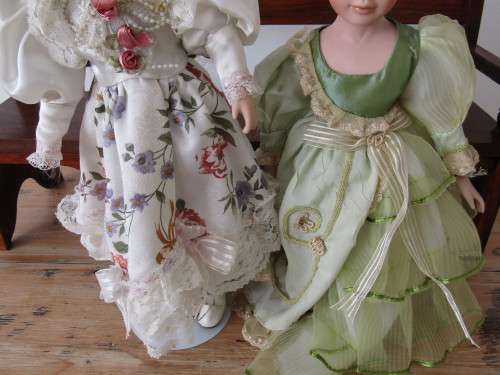 2 x Vintage porcelain Dolls with wooden Bench, 40cm dolls and 54cm bench.