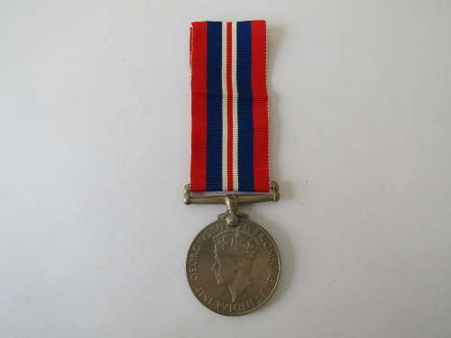 1939 - 1945 WW2 Medal, awarded to G Roots