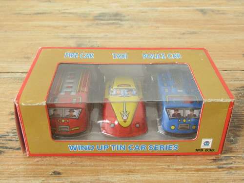 Boxed set of 3 vintage wind up tin Cars, Fire car, Taxi and Police car with winding keys mint in box