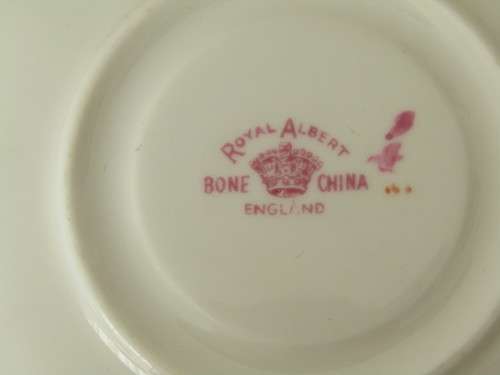 Vintage Royal Albert crown China Milk jug and 2 x saucers, 3 items in the lot, red and black stamps