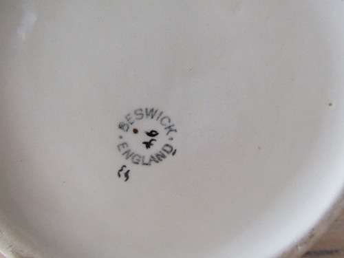 A humerous Beswick Character toby Jug "Behind every great Man", large 23cm