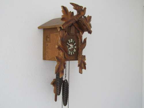 Vintage wall mounted wooden mechanical Cukoo Clock with Weights and Pendulum, made in Germany