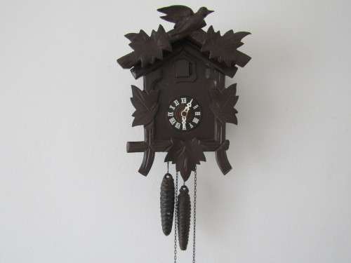 Vintage wall mounted wooden mechanical Cukoo Clock with Weights and Pendulum, made in West Germany