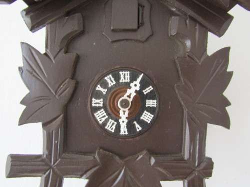 Vintage wall mounted wooden mechanical Cukoo Clock with Weights and Pendulum, made in West Germany