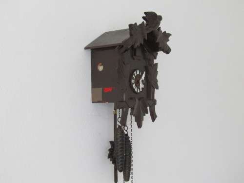 Vintage wall mounted wooden mechanical Cukoo Clock with Weights and Pendulum, made in West Germany