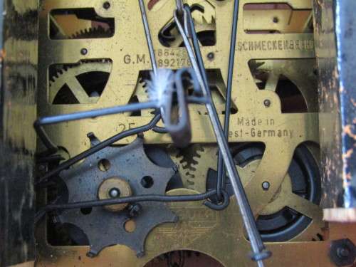 Vintage wall mounted wooden mechanical Cukoo Clock with Weights and Pendulum, made in West Germany