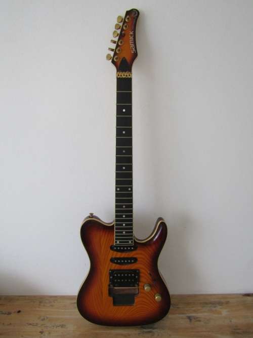 Samick Electric Guitar, by Valley Art Guitar custom pro shop, needs repairs
