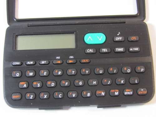 Vintage Travel Master, world time, calender, clock, conversions, alarm, etc., mint and working