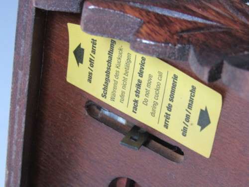 German mechanical Black Forest Cuckoo Clock with pendulum and weights and in excellent working cond.