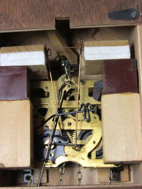 German mechanical Black Forest Cuckoo Clock with pendulum and weights and in excellent working cond.