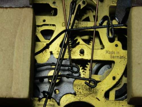 German mechanical Black Forest Cuckoo Clock with pendulum and weights and in excellent working cond.