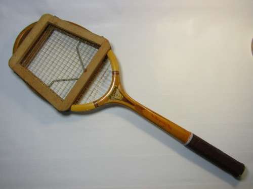 Vintage Champion Tennis Racket with a Dunlop Stretcher in excellent condition