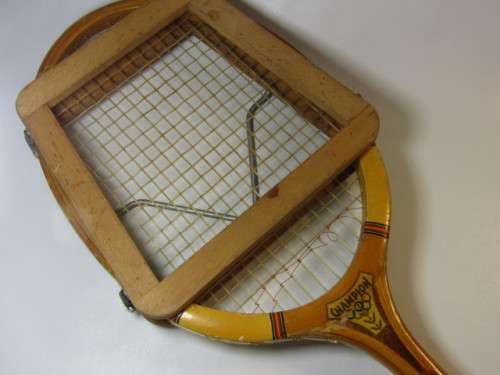 Vintage Champion Tennis Racket with a Dunlop Stretcher in excellent condition