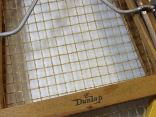 Vintage Champion Tennis Racket with a Dunlop Stretcher in excellent condition