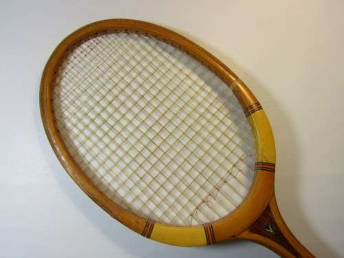 Vintage Champion Tennis Racket with a Dunlop Stretcher in excellent condition