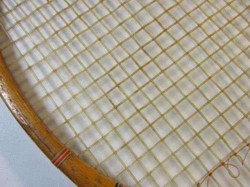 Vintage Champion Tennis Racket with a Dunlop Stretcher in excellent condition