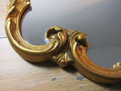 Beautiful vintage Mirror in ornate gilded Frame with scroll motive, excellent condition, 54cm x 68cm