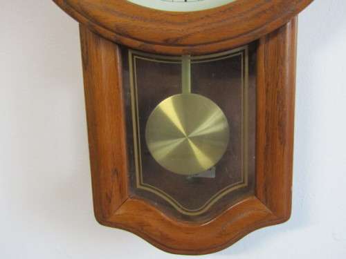Vintage wooden Seiko quartz Wall Clock with Pendulum, excellent condition, 48cm x 29cm