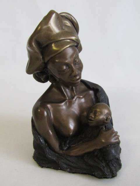 Vintage Signed Bronzed resin Figurine of a Woman holding a Baby in excellent condition, 17cm high