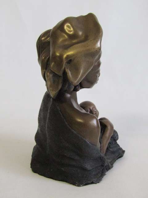 Vintage Signed Bronzed resin Figurine of a Woman holding a Baby in excellent condition, 17cm high