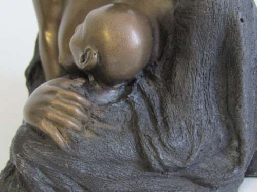 Vintage Signed Bronzed resin Figurine of a Woman holding a Baby in excellent condition, 17cm high