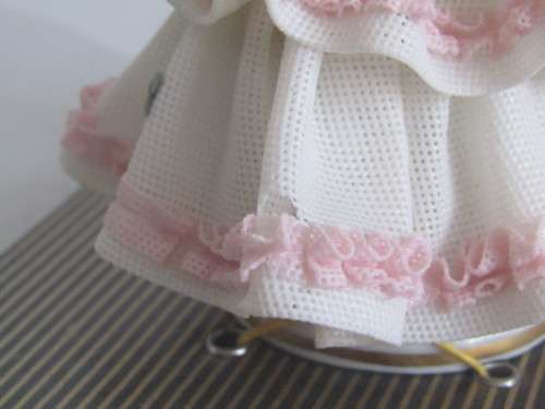 Lot of two collectable porcelain Figurines; Royal Doulton "Cissie" 13cm and Dresden in Box 12cm