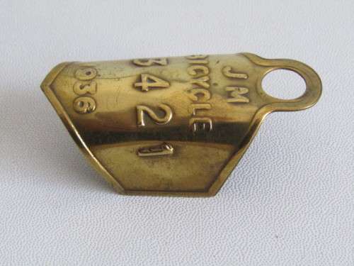 Lot of 3 collectable items; 1899 Star Safety Razor Tin,Brass mathematical set and a 1936 Bicycle Tag