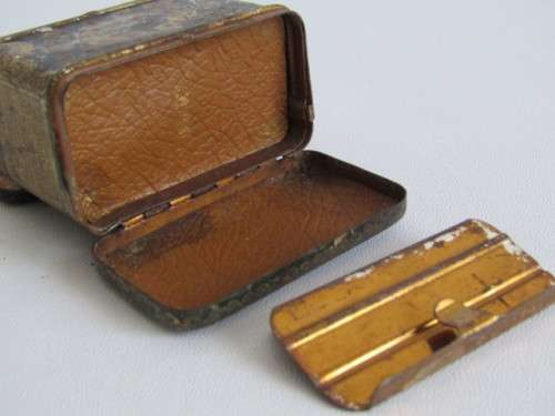 Lot of 3 collectable items; 1899 Star Safety Razor Tin,Brass mathematical set and a 1936 Bicycle Tag