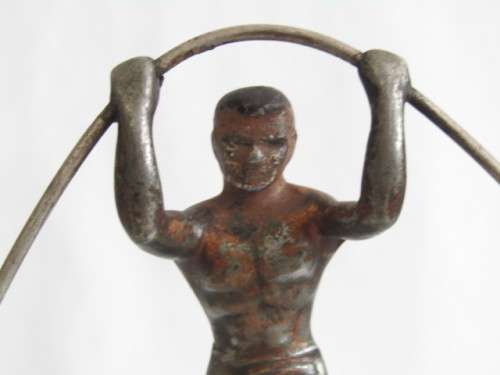 Rare large vintage metal "Balancing Man" statue on Plinth with Ashtray Base, 36cm high