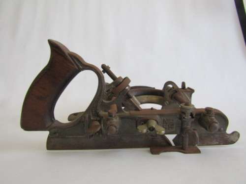 Antique Stanley No. 55 Combination Plane with wooden handles, Stanley Rule & Level Co. Blade