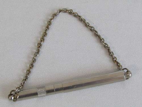 Unusual stainless steel Pitch adjustable Dog Whistle on a Chain, excellent and working condition