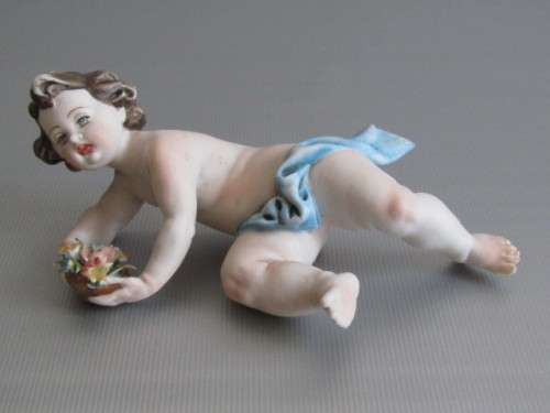 Vintage lot of 2 Porcelain Figurines; Angel with Bird and Cat, 13cm, Cherub holding flowers, 14cm