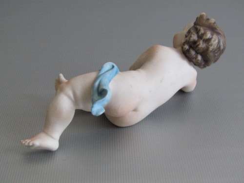 Vintage lot of 2 Porcelain Figurines; Angel with Bird and Cat, 13cm, Cherub holding flowers, 14cm