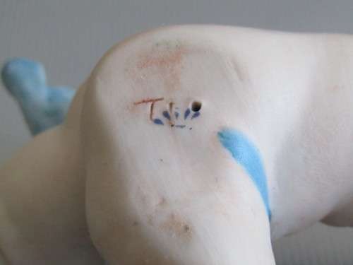 Vintage lot of 2 Porcelain Figurines; Angel with Bird and Cat, 13cm, Cherub holding flowers, 14cm