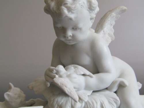 Vintage lot of 2 Porcelain Figurines; Angel with Bird and Cat, 13cm, Cherub holding flowers, 14cm