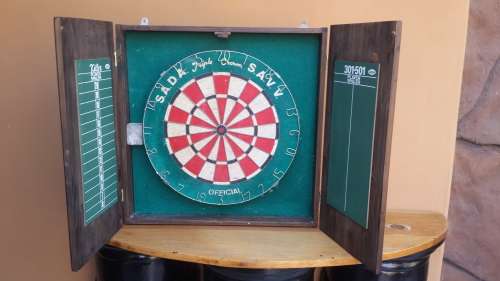 Dart board in Wooden Wall Case