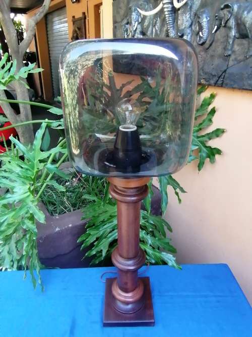 Wooden lamp with molded plastic shade