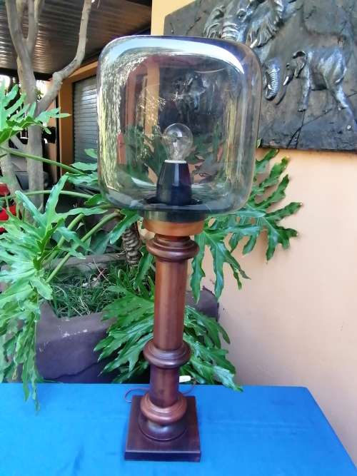 Wooden lamp with molded plastic shade