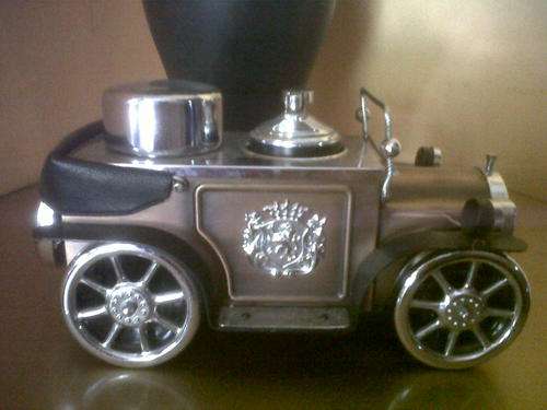 VINTAGE CAR LIGHTER AND CIGARETTE HOLDER ( MUSICAL BOX)
