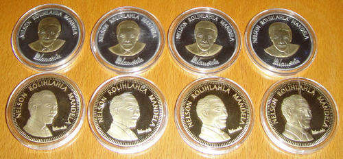 Eight (8) Crown-sized Nelson Mandela Medallions